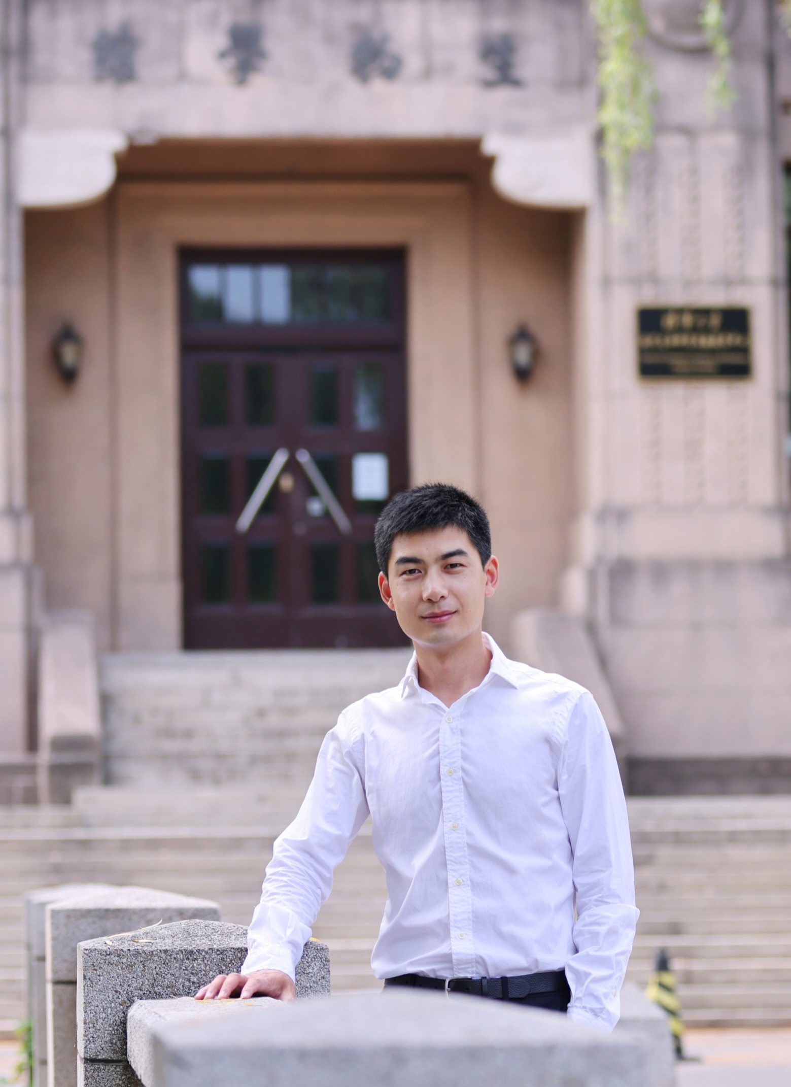 Weimin Zhang